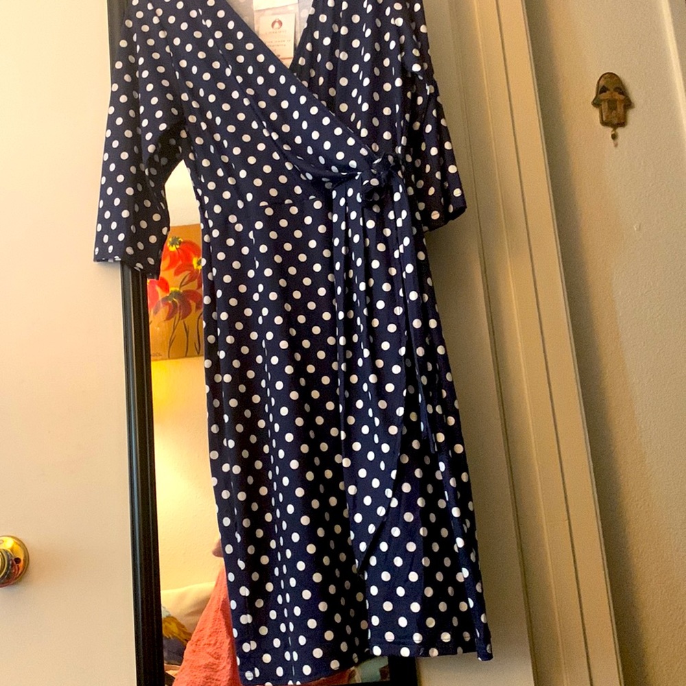 Classic long cross over dress either blue or pink. Style great for slimming!